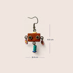 A single dangling earring shown on a plain light beige background, with measurement lines and text indicating 4.0 cm height and 2.